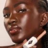 UNREAL SKIN SHEER GLOW TINT FEUCHTIGKEITSSPENDENDER FOUNDATION-STICK 16 DEEP